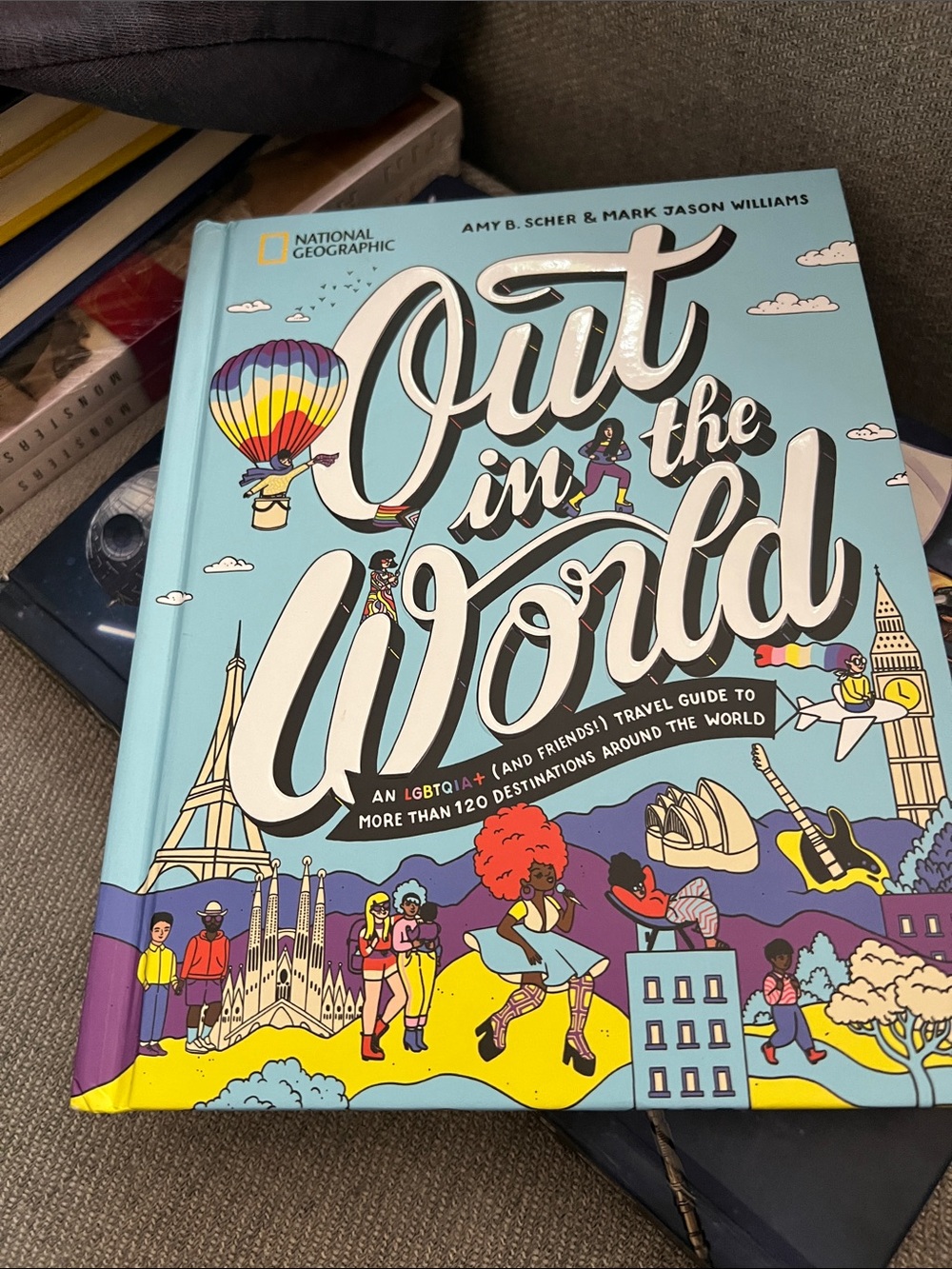 Out in the World By Amy B. Scher and Mark Jason Williams May 2024 Orig $30